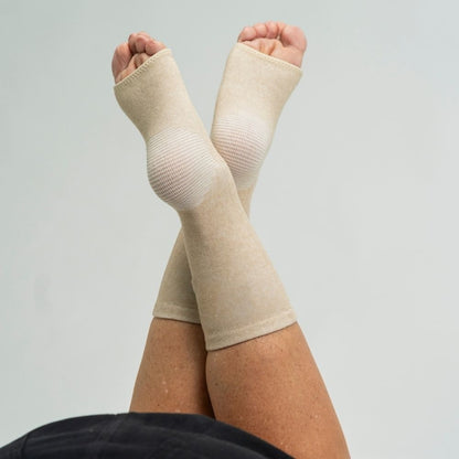 Manchons beige, talons et voûte maintenus